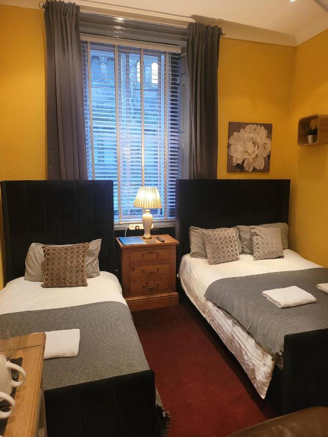 Chambre Triple avec Salle de Bains Privative