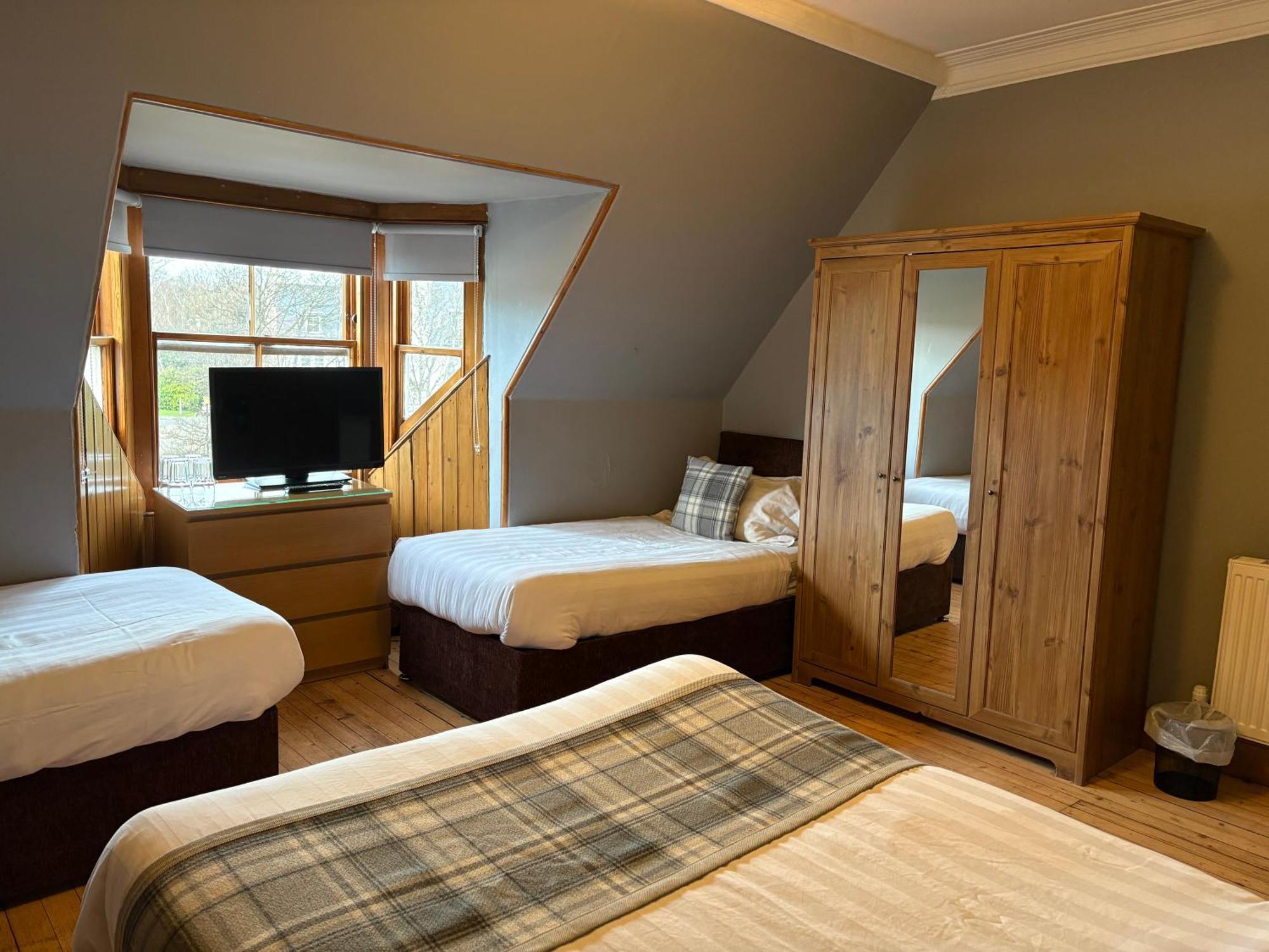 Chambre Quadruple avec Salle de Bains