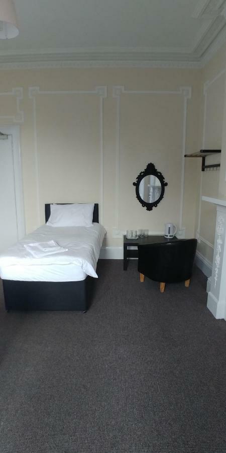 Chambre Triple avec Salle de Bains Commune